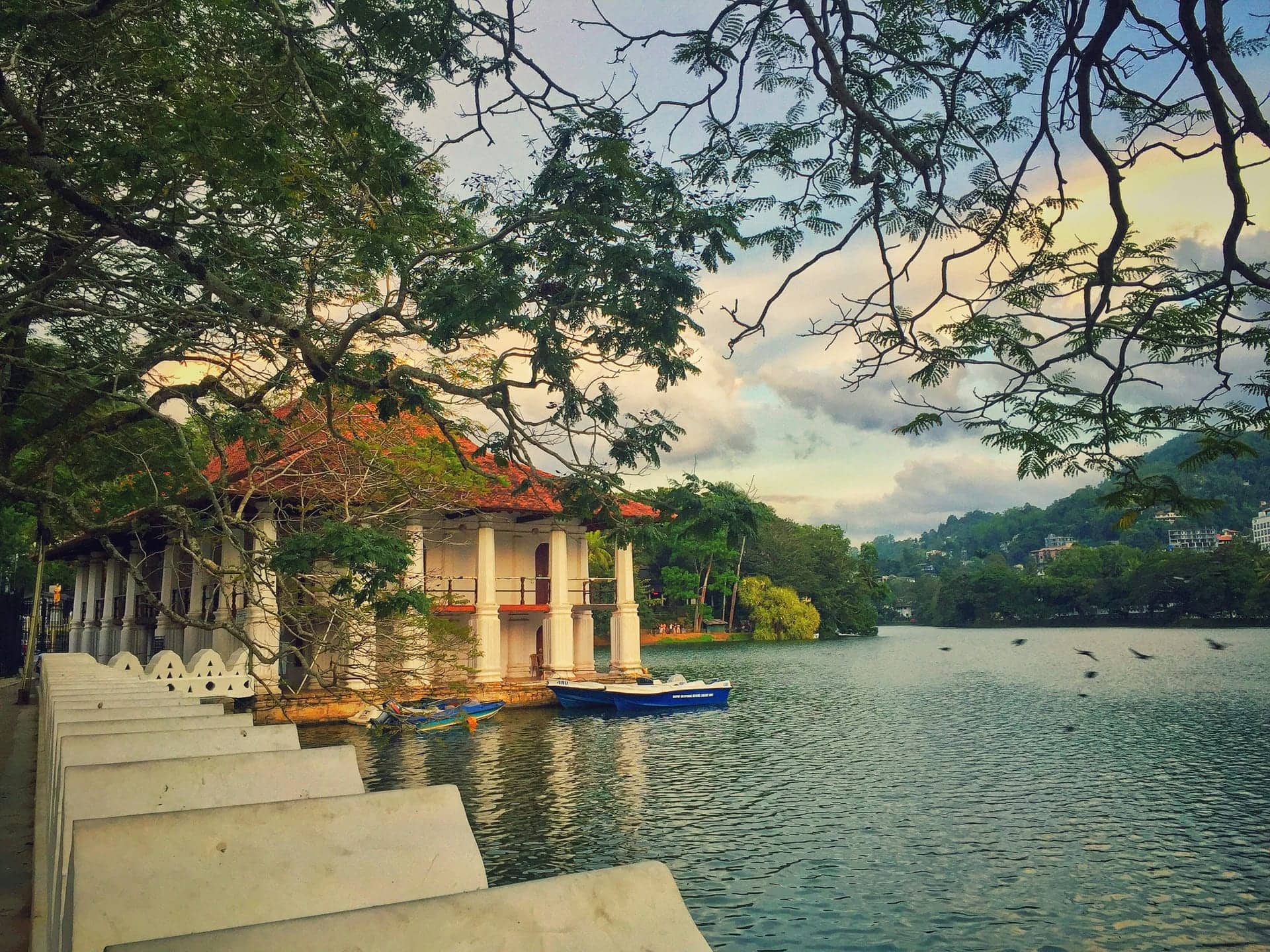 Lakeside pavilion and boats on Kandy Lake